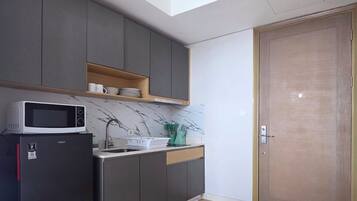 Appartement, 3 chambres, vue ville | Cuisine privée | Mini réfrigérateur, plaque de cuisson