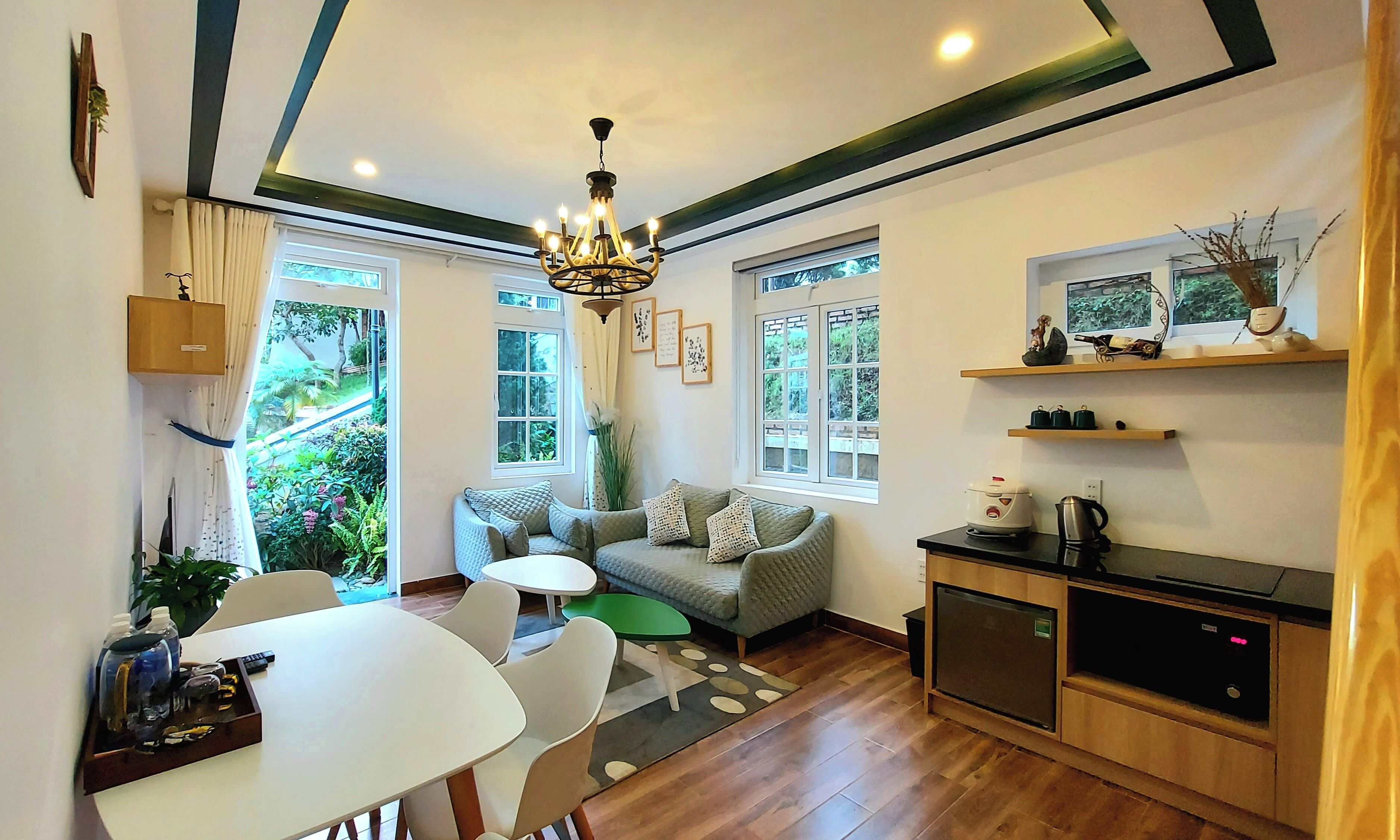 Appartement Familial, vue jardin | Coin séjour