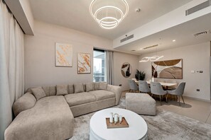 Living area - Burj View Stylish 3BR with Maids Room (Dubai)