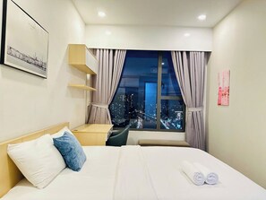 Family Apartment, Balcony | Premium bedding, pillow-top beds, minibar, in-room safe - SS Homes River Gate Premium (Ho Chi Minh)