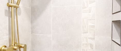 Shower, towels, soap, toilet paper