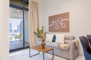 Apartment, Balcony, City View | Living area | TV - Bloomfields Magnificent 1Br Al Marya  (Abu Dhabi)