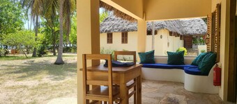 Comfortable beach villa, located directly by the sea, tropical garden