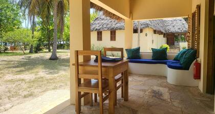 Comfortable beach villa, located directly by the sea, tropical garden