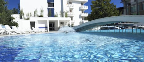Seasonal outdoor pool, pool umbrellas, pool loungers