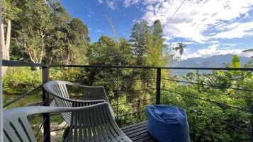 Family Double Room, Balcony, Garden View | Property grounds