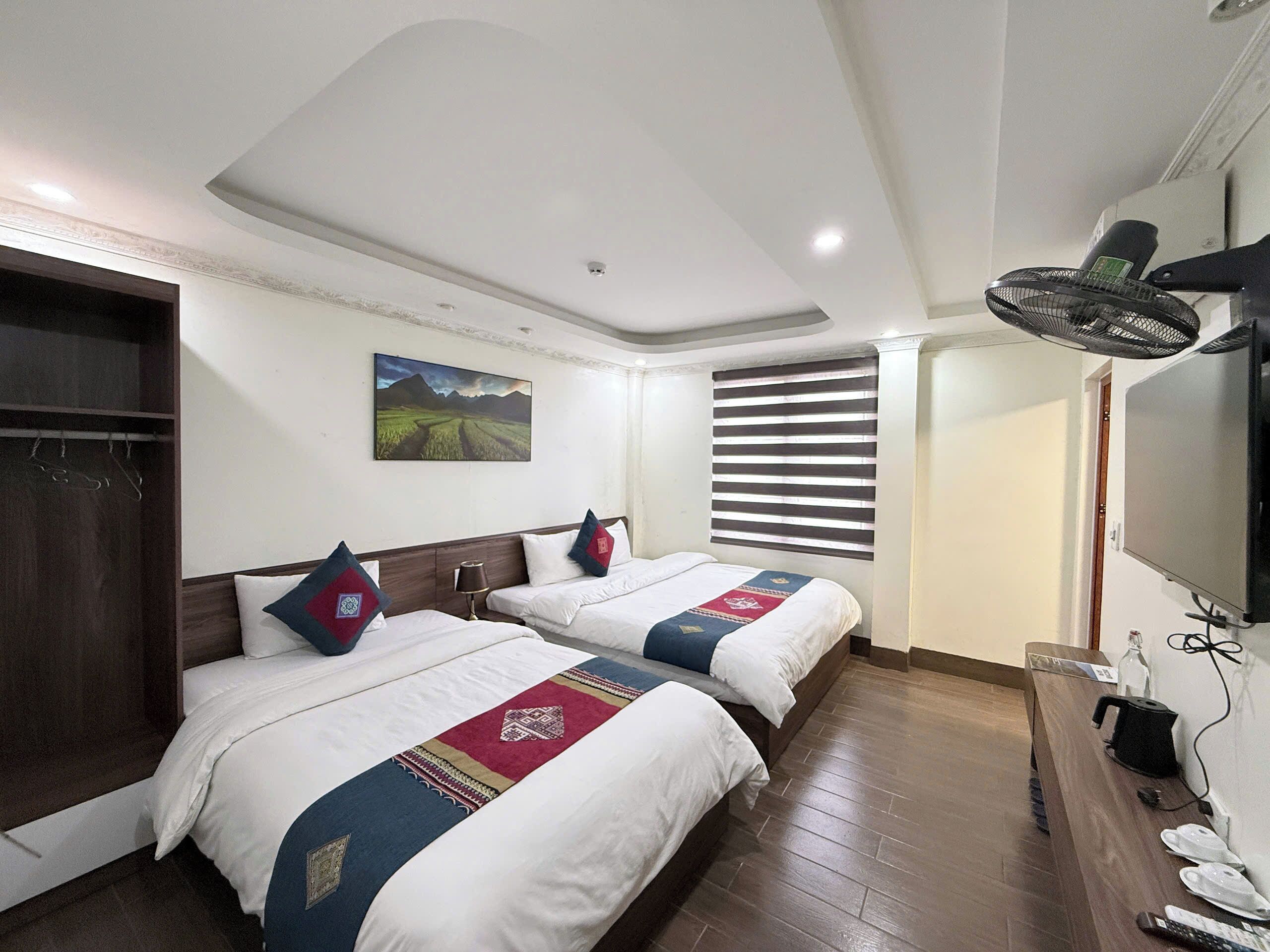 Quarto triplo luxo, vista para a cidade