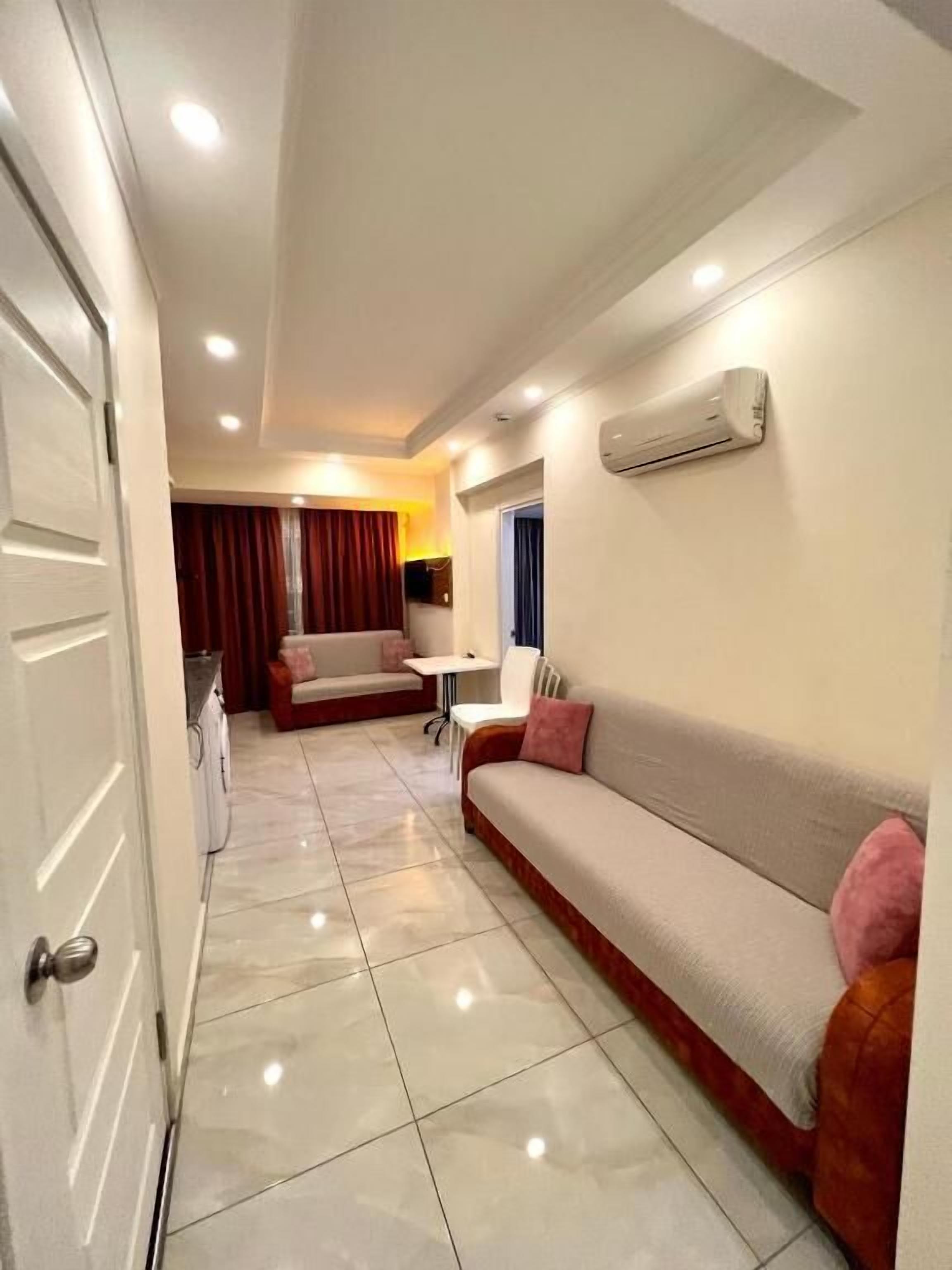 Vierbettzimmer, Stadtblick | Wohnbereich