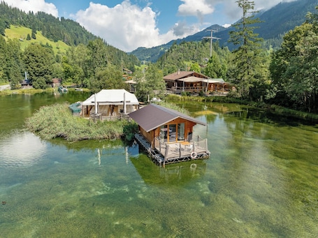 Exterior. Tiny Waterhouse on a Lake with shared Bathroom