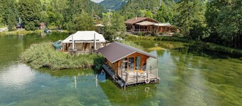 Tiny Waterhouse on a Lake with shared Bathroom