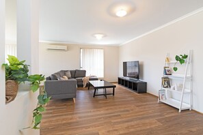 Family House, Patio, Garden View | Living area - Family Home for a Fiesta (Elizabeth Downs)