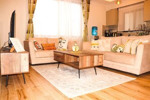 Living area - Elite Residence 1 BR: Balcony, Heated Pool, Power backup, Sky Gym& 24/7 Security (Nairobi)