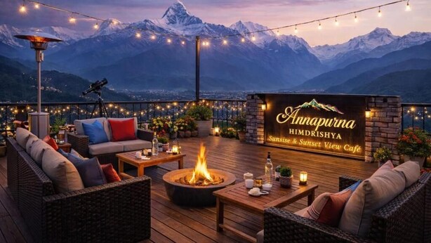 A cozy outdoor seating area with a fire pit, wicker furniture, and a sign for 'Annapura Himaldriya Sunrise & Sunset View Café'. - Annapurna Himdrishya Pokhara Homestay (Pokhara)