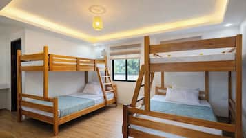Habitación familiar, baño privado | Wifi gratis y ropa de cama