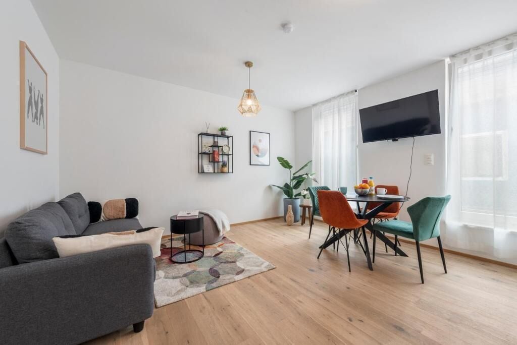 Apartment, 1 King-Bett und Schlafsofa | Wohnbereich | Flachbildfernseher