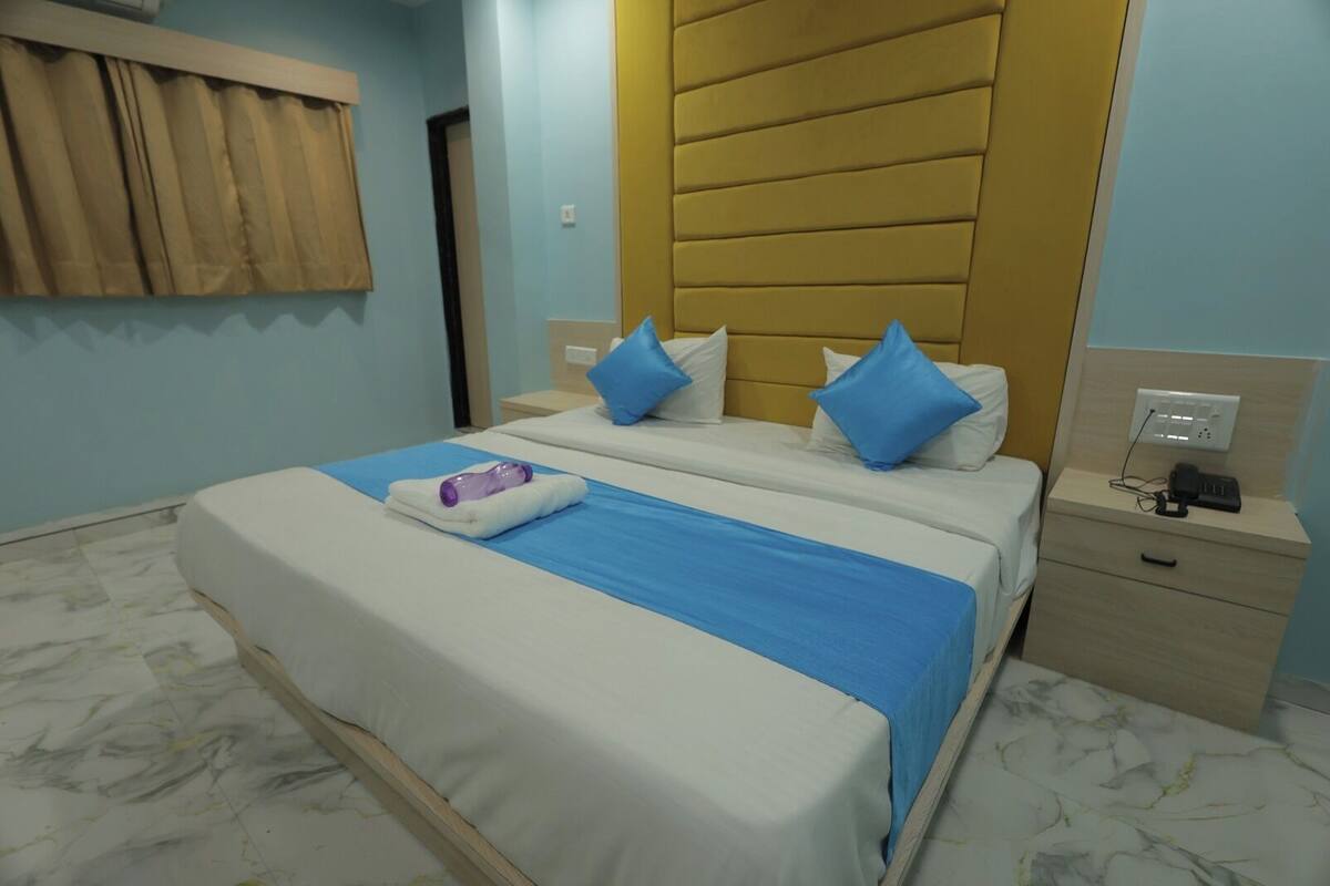 Quarto casal luxo, vista para a cidade