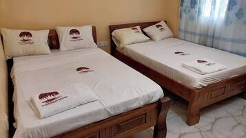 Quarto duplo luxo, vista para a cidade