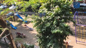 Children’s area - Sukoon 2BHK| Near Metro Station in Lajpat Nagar Amar Colony Free Parking (New Delhi)