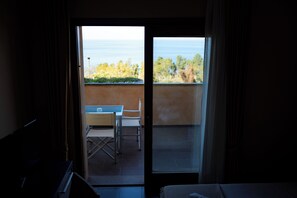 Quarto quádruplo, vista para o mar | Parte interna