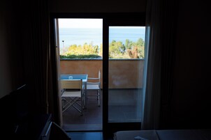 Habitación cuádruple, vistas al mar | Interior