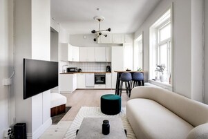 Apartamento luxo, vista para a cidade | Área de estar