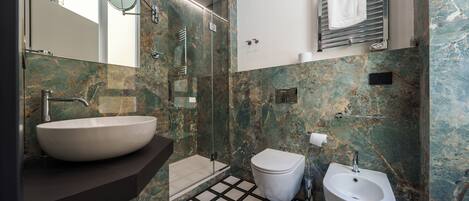 Superior Room | Bathroom | Shower, hair dryer, towels, soap