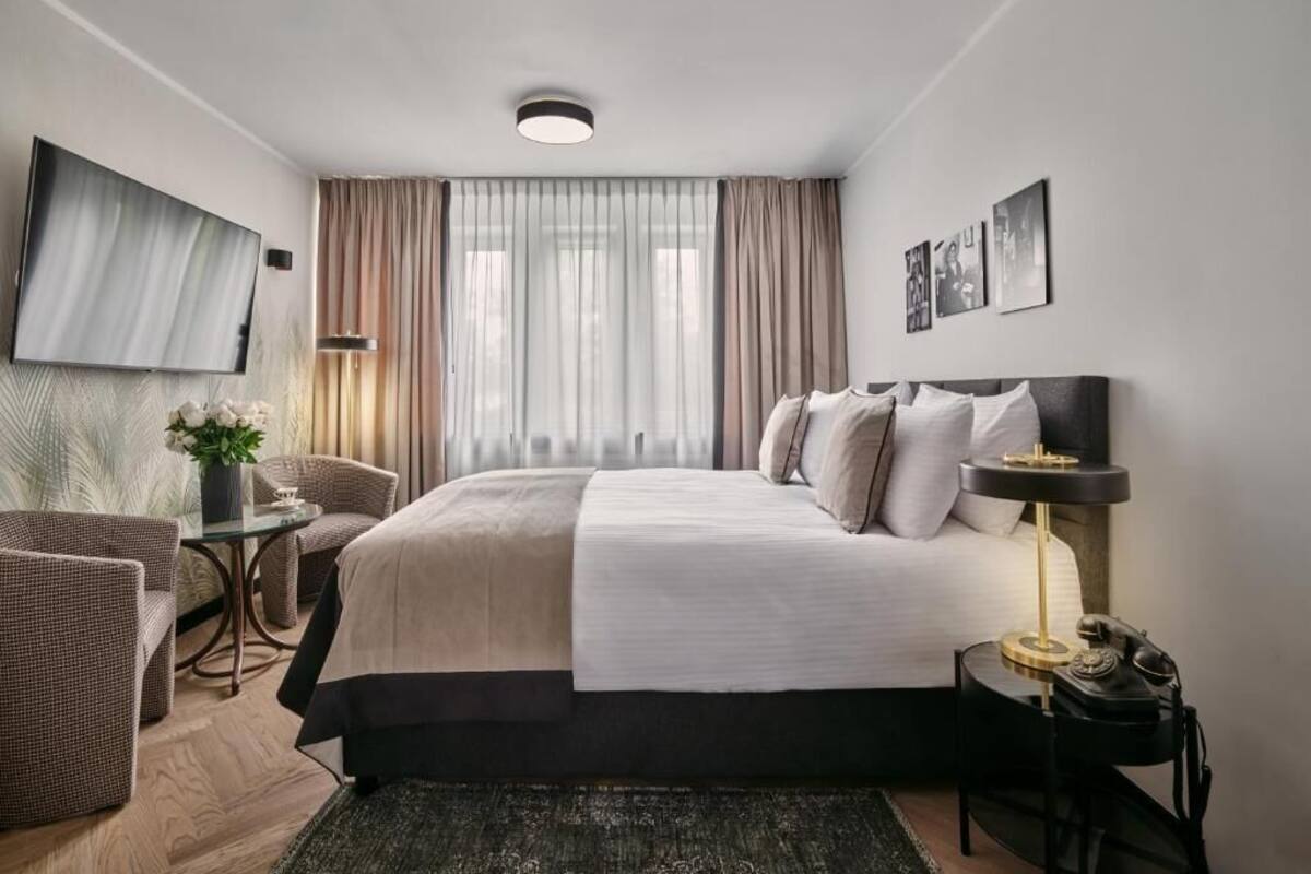 Habitación Deluxe | Minibar, caja fuerte, escritorio y wifi gratis
