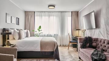 Habitación Deluxe | Minibar, caja de seguridad en la habitación, escritorio y wifi gratis