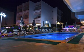 Seasonal outdoor pool, pool umbrellas, pool loungers