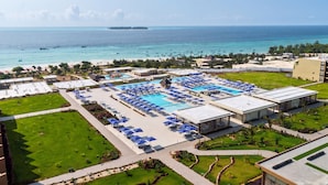 A resort with multiple swimming pools, a beach, and a view of the ocean. - Iberostar Selection Zanzibar – All-Inclusive (Matemwe)
