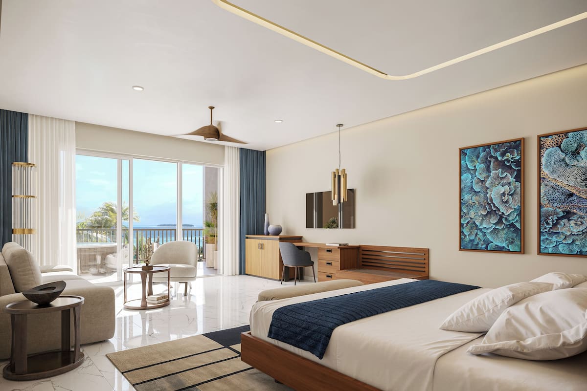 Un dormitorio moderno con una cama grande, un escritorio y un balcón con vistas.