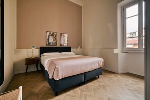 Appartamento con una camera da letto e divano letto