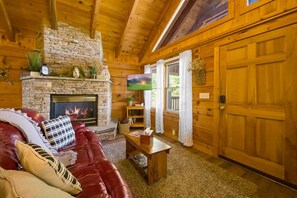 TV, fireplace, offices - Location  Cute Studio Log Cabin Hot Tub Fireplace (Pigeon Forge)