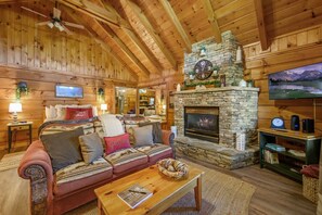 TV, fireplace, offices - Location  Cute Studio Log Cabin Hot Tub Fireplace (Pigeon Forge)