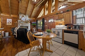 Fridge, microwave, oven, stovetop - View  Location  Studio Log Cabin Hot Tub Fireplace (Pigeon Forge)