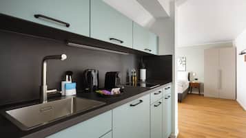 Suite Comfort, terrazzo | Cucina privata | Macchina per caffè espresso, bollitore elettrico