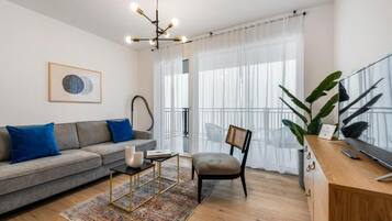 Căn hộ Superior, ban công, quang cảnh sân vườn | Khu phòng khách