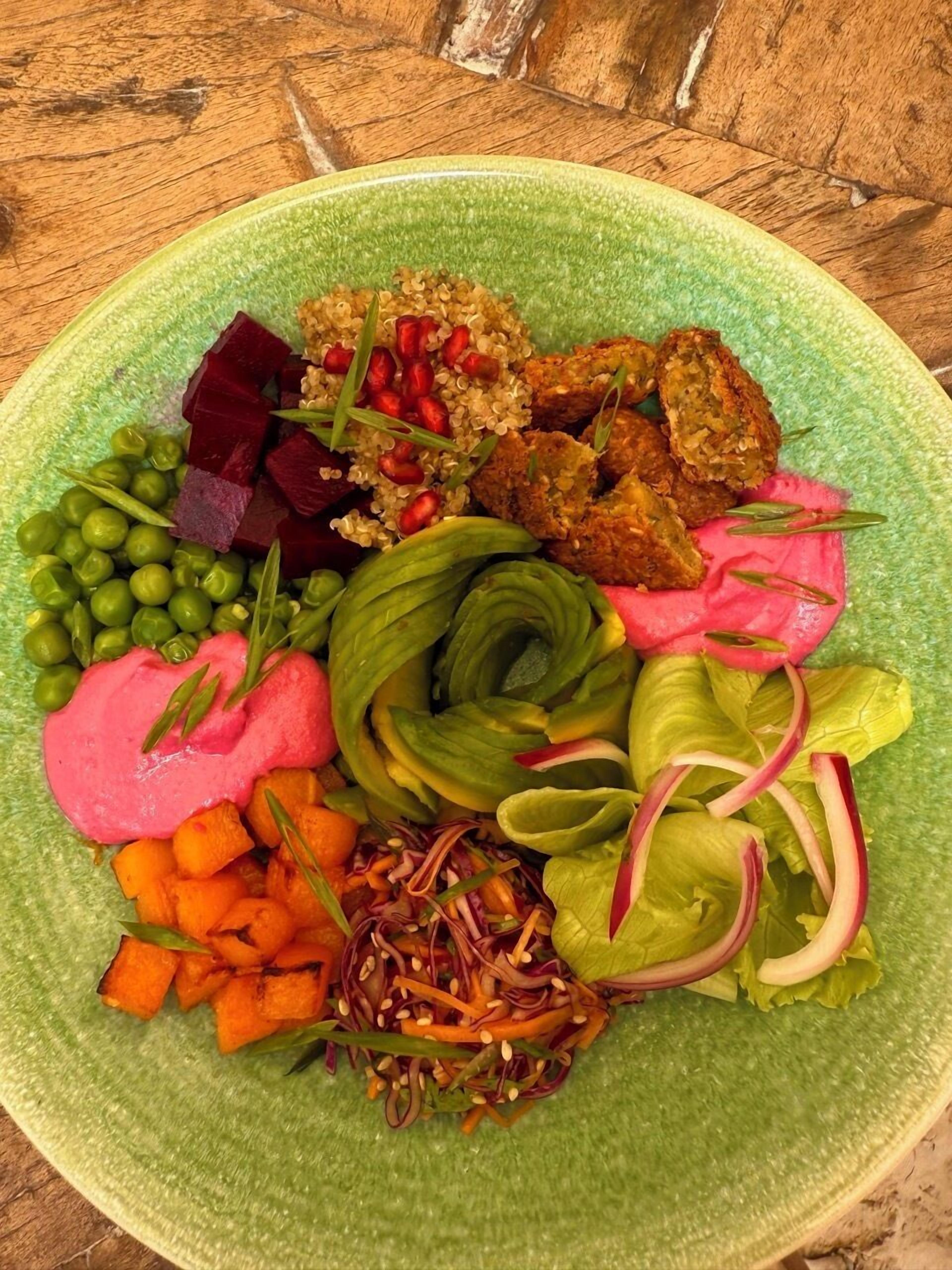 A plate of assorted vegetables and grains.