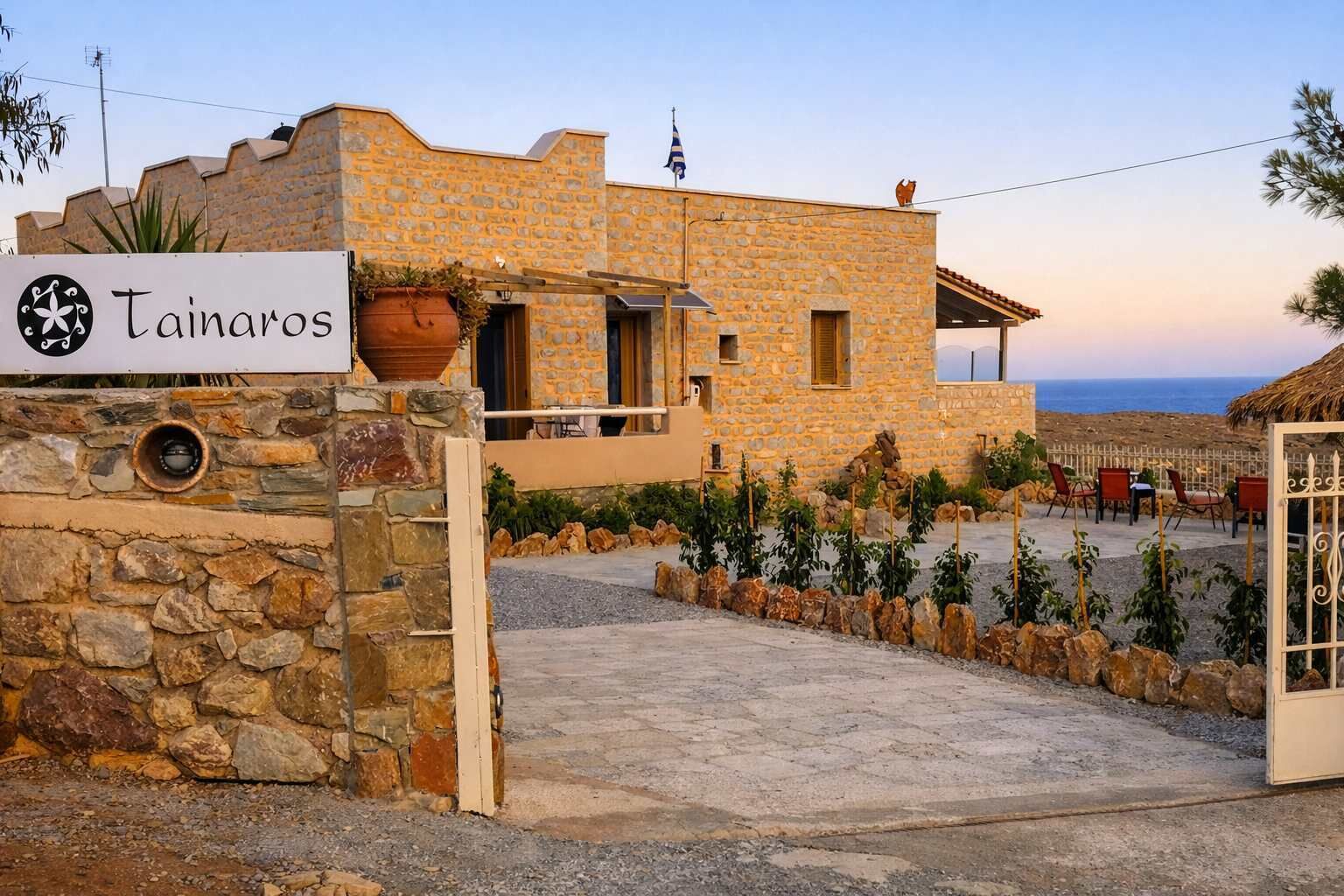 Entrance to Tainaros Guesthouse with Traditional Stone Architecture