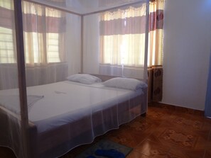 Quarto casal luxo, vista para a cidade