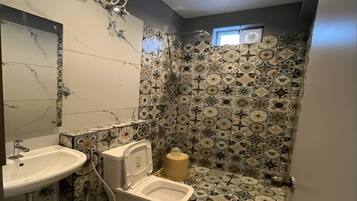 Quarto triplo luxo | Banheiro