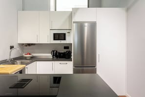 Private kitchen - This exclusive loft-style apartment in the heart of Tetouan perfectly blends contemporary luxury, intelligent design, and a warm, sophisticated aesthetic. (MADRID)