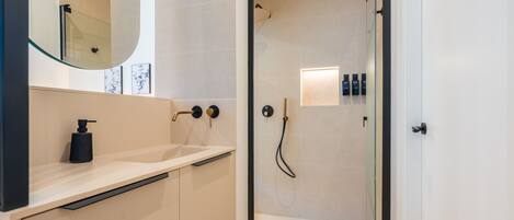 Shower, hair dryer, towels