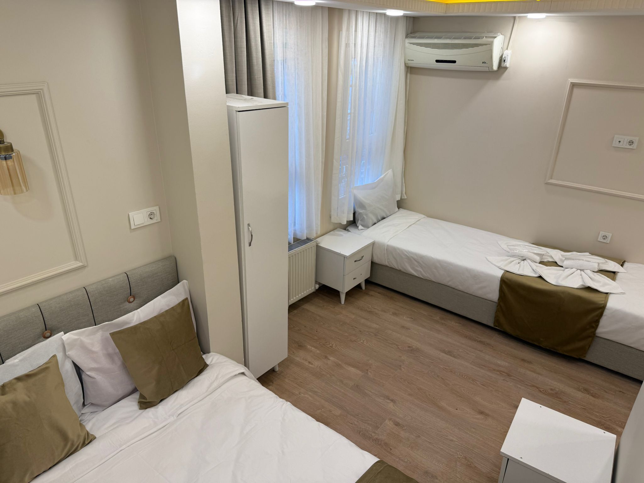 Family Quadruple Room, City View | Soundproofing, iron/ironing board, free WiFi