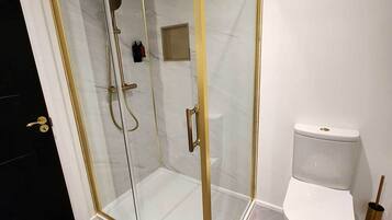 Hair dryer, towels, soap, shampoo