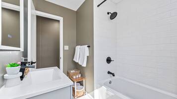 Hair dryer, towels, soap, shampoo