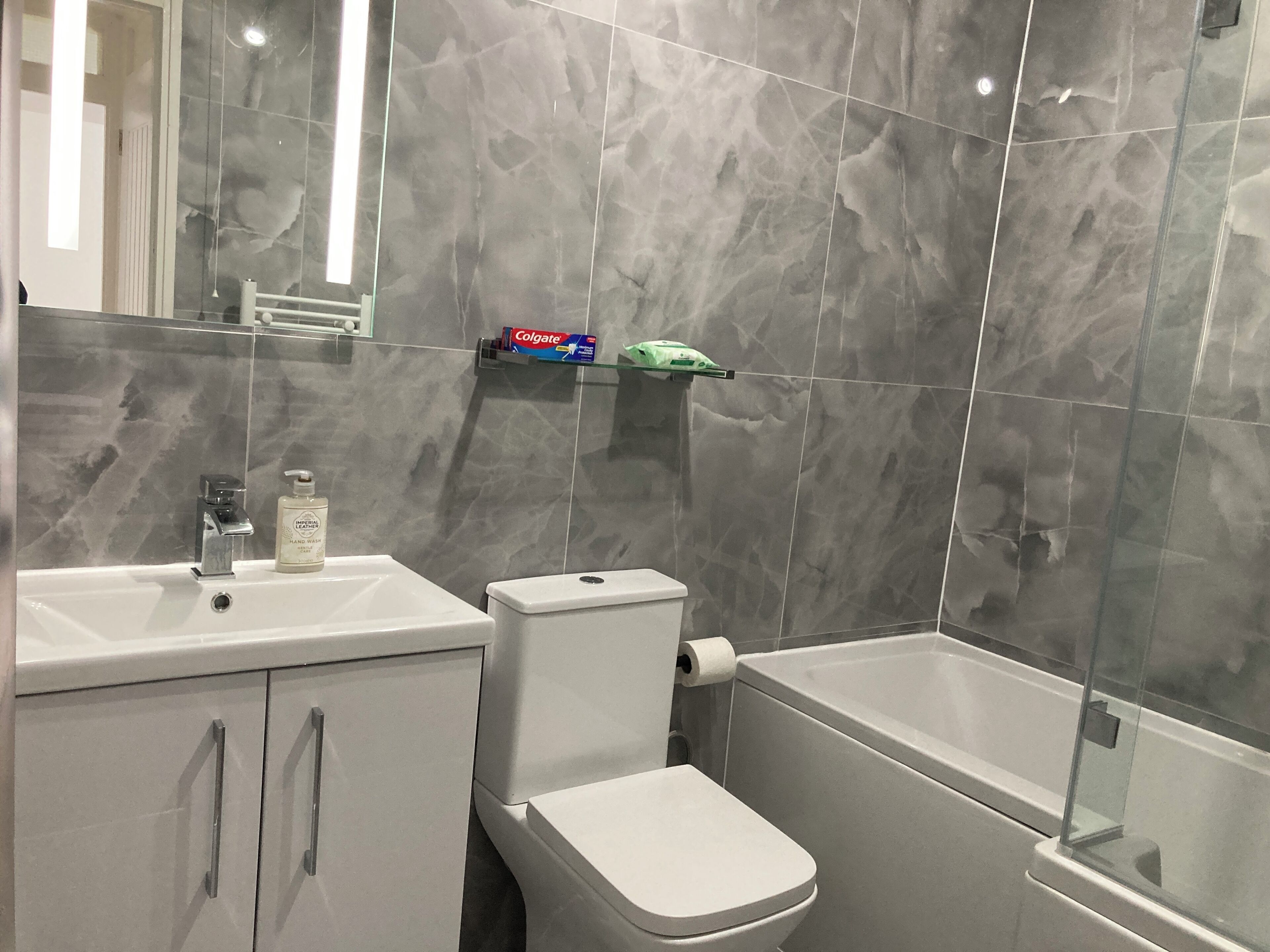 Hair dryer, towels, soap, toilet paper