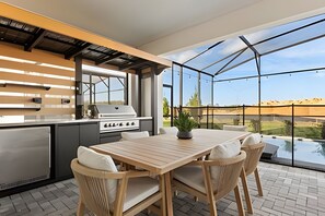 Outdoor dining - 7 Bd / 5.5 Ba / Windsor Cay Resort/ Sleeps 20 (Clermont)