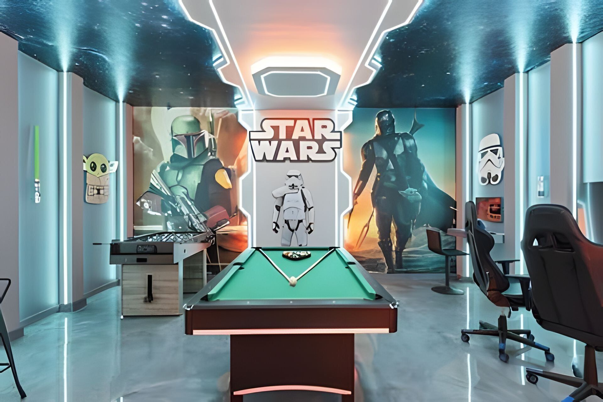 Une salle décorée sur le thème de Star Wars, avec une table de billard, des fauteuils de jeu et une grande affiche représentant les personnages.