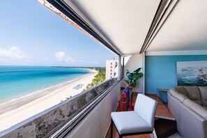 A balcony with a view of a beach and ocean. - Isla Verde Oceanview 4BR With Private Beach Access (Carolina)